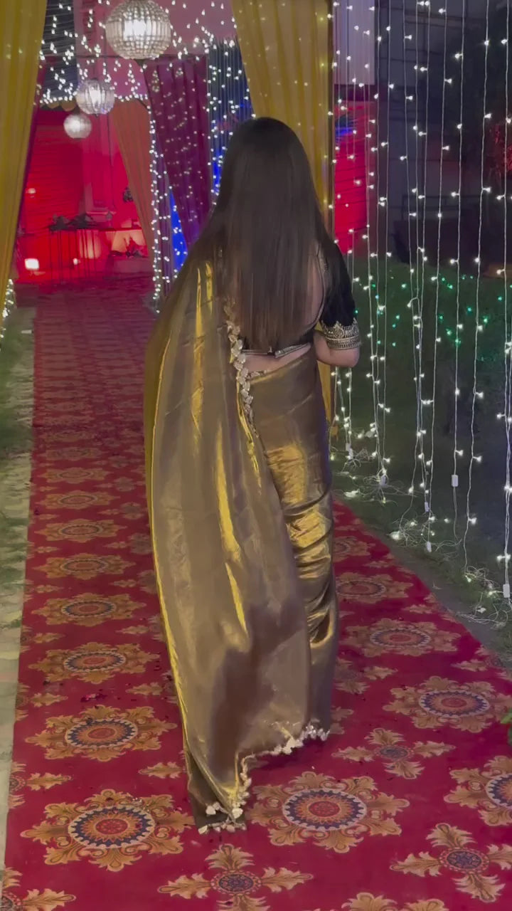 Festive Golden Tissue Saree with Embroidered Lace Border
