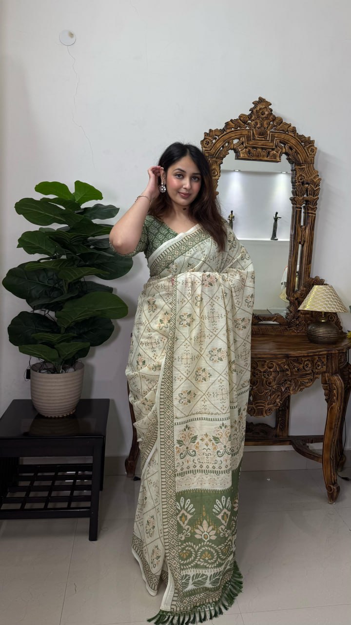 Elegant Cream and Green Cotton Saree with Floral Motifs