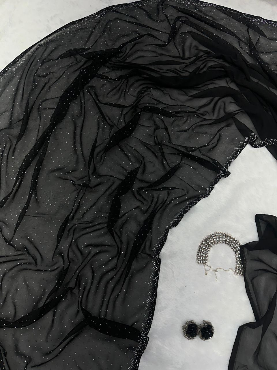 Pure Georgette saree with Swarovski Diamond work