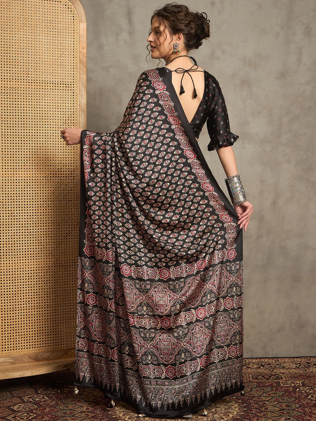 Black Gajji Silk Saree with Traditional Red & Beige Ajrakh Patterns and Tassel Detailing