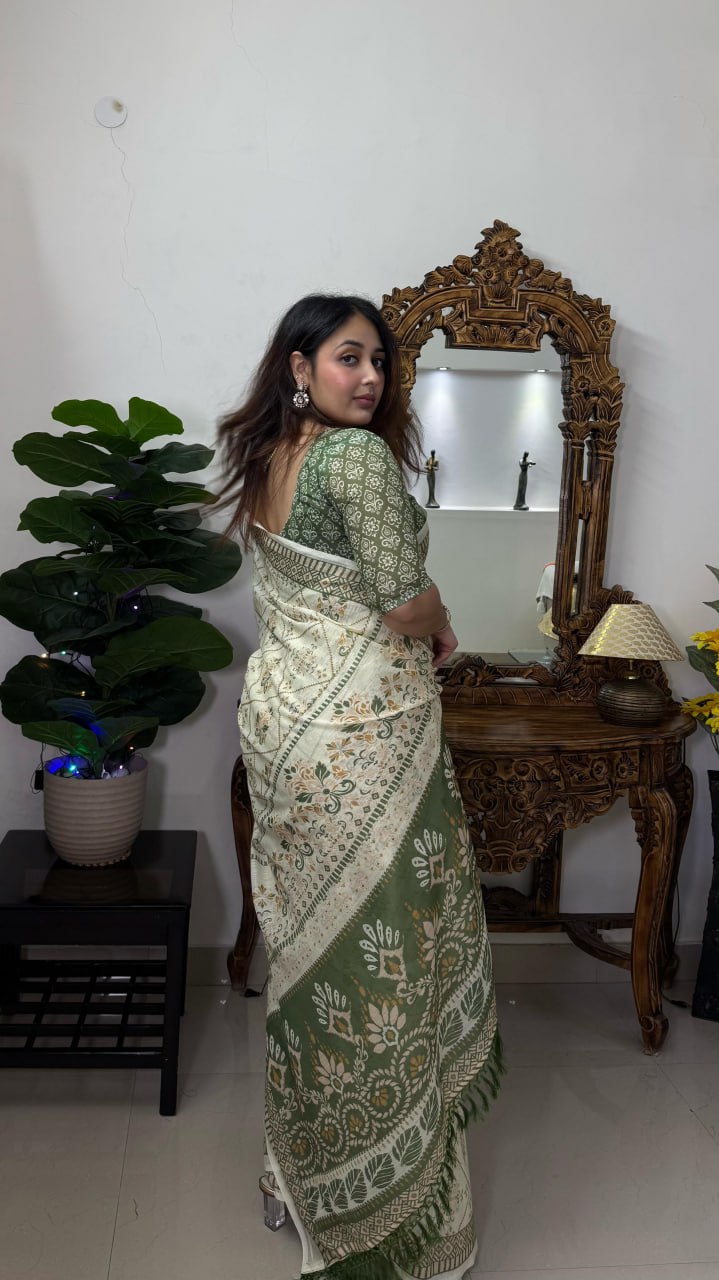 Elegant Cream and Green Cotton Saree with Floral Motifs