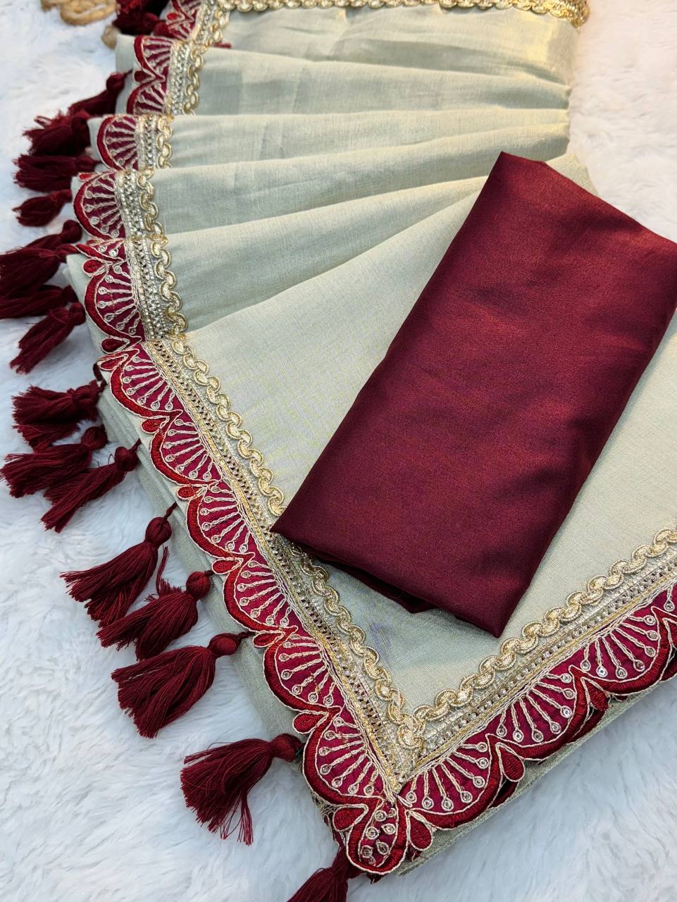 Ivory Tissue Soft Saree with Maroon Lace and Handmade Tassels