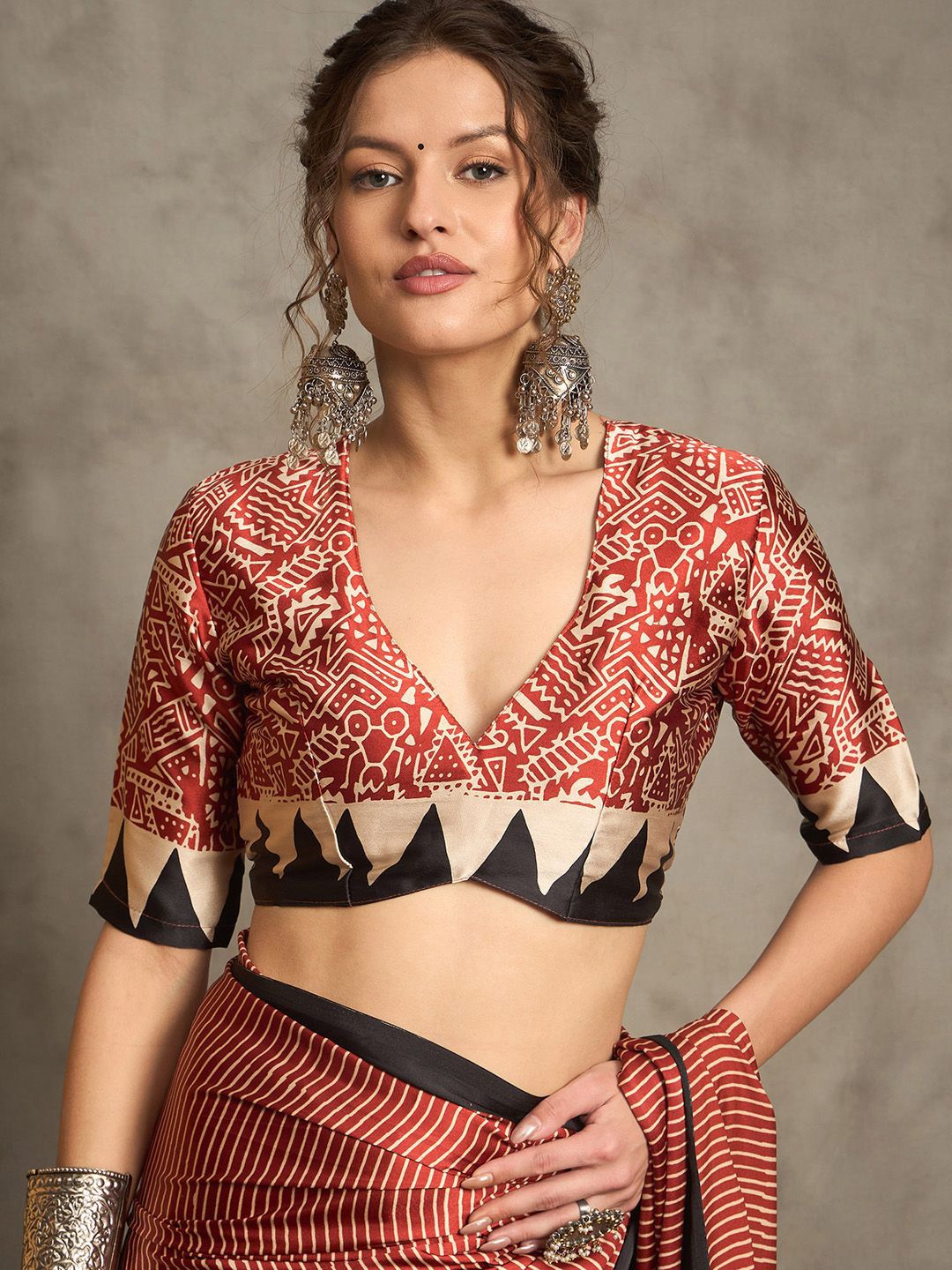 Contemporary Rust & Black Gajji Silk Saree with Tribal-Inspired Border & Printed Blouse