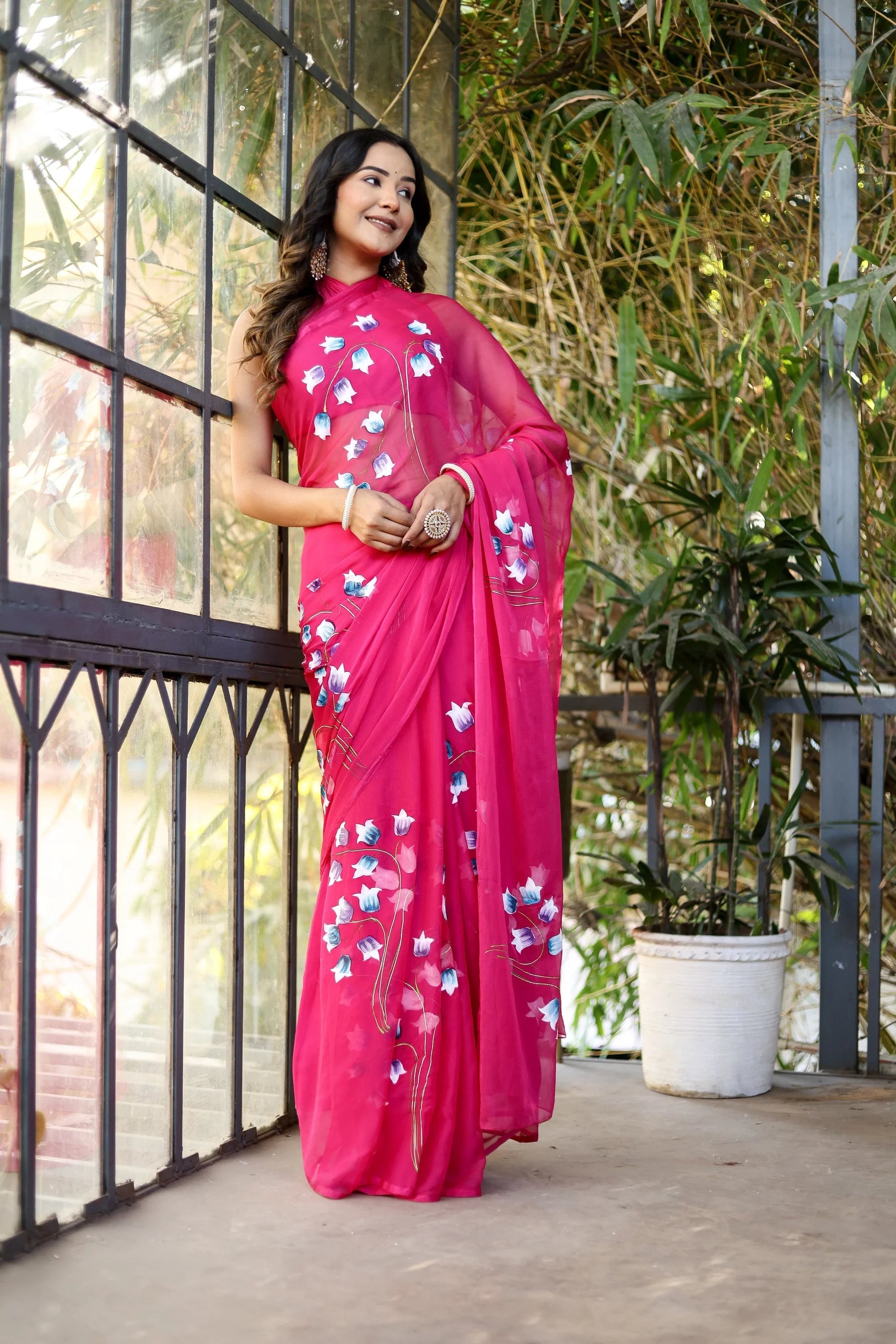 Rani Pink Georgette Saree with Hand-Painted Blue & White Bell Flowers – Attached Blouse – 5.5 Meters
