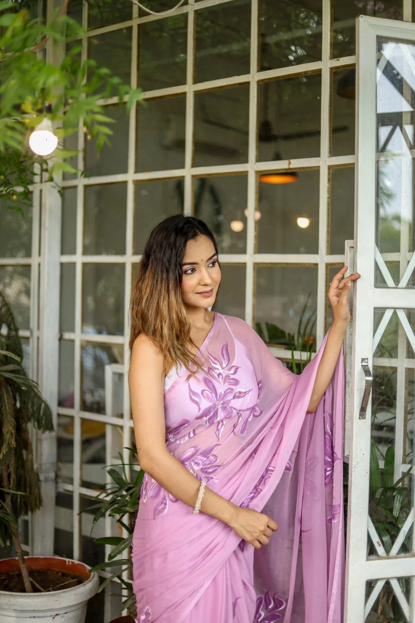 Lavender Georgette Saree with Hand-Painted Purple Floral Motifs & Pearl Highlights – Attached Blouse – 5.5 Meters