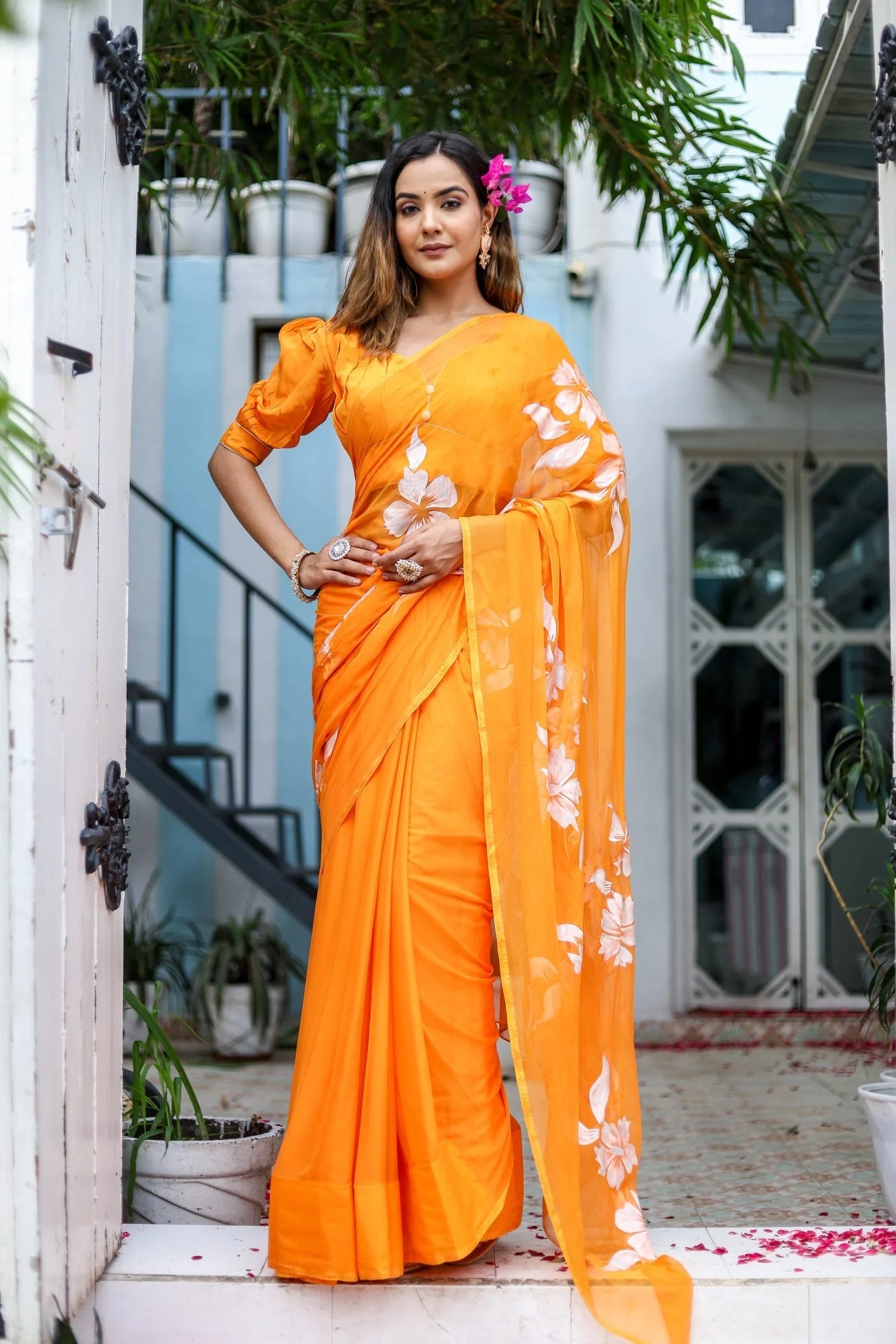 Sunset Orange Georgette Saree with Hand-Painted White Floral Motifs – Attached Blouse – 5.5 Meters