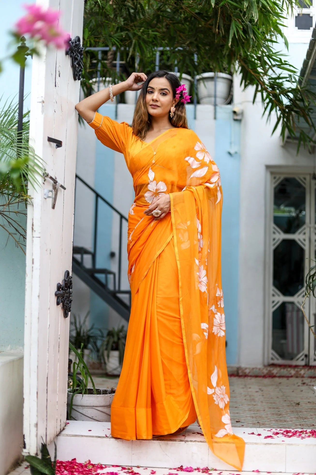 Sunset Orange Georgette Saree with Hand-Painted White Floral Motifs – Attached Blouse – 5.5 Meters