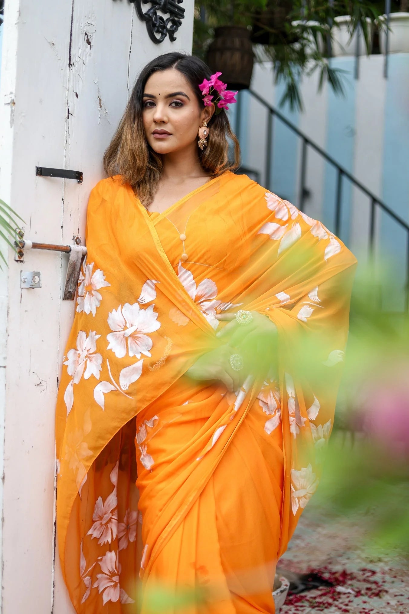 Sunset Orange Georgette Saree with Hand-Painted White Floral Motifs – Attached Blouse – 5.5 Meters