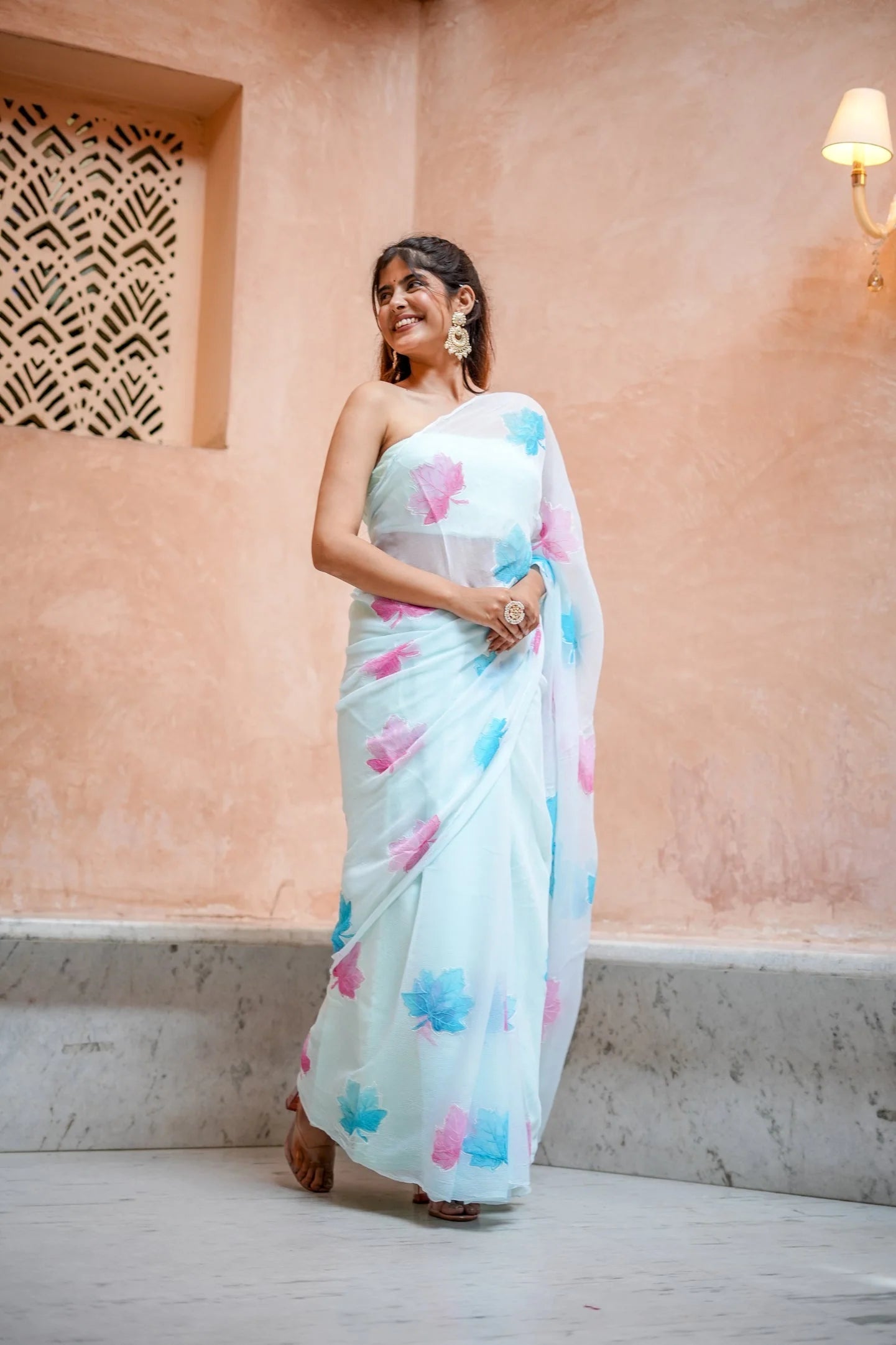 Sky Blue Georgette Saree with Embroidered Pink & Blue Leaf Motifs – Attached Blouse – 5.5 Meters