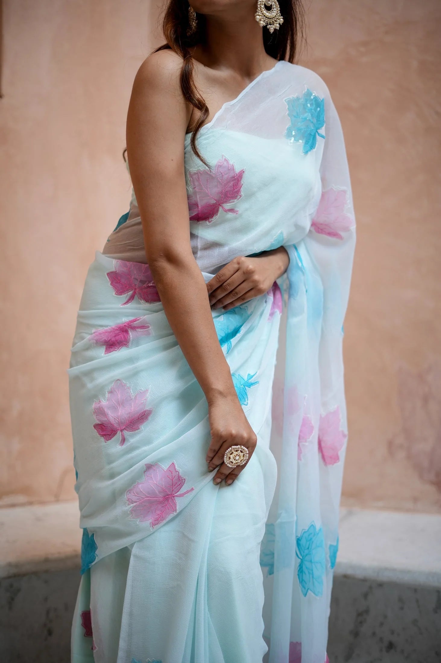 Sky Blue Georgette Saree with Embroidered Pink & Blue Leaf Motifs – Attached Blouse – 5.5 Meters