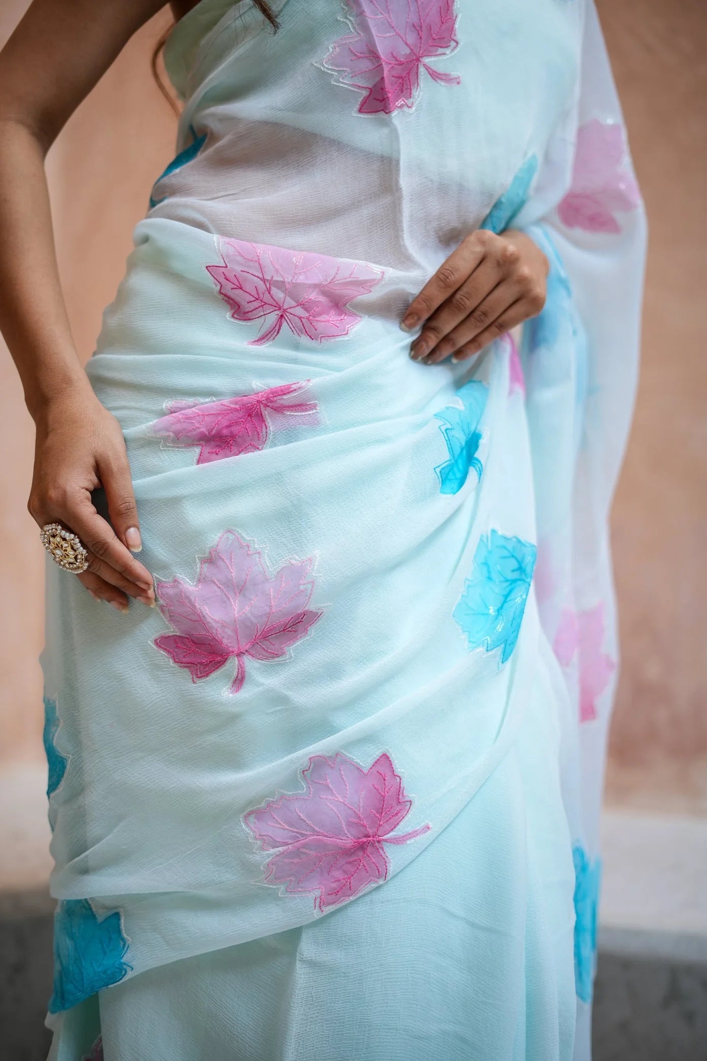 Sky Blue Georgette Saree with Embroidered Pink & Blue Leaf Motifs – Attached Blouse – 5.5 Meters