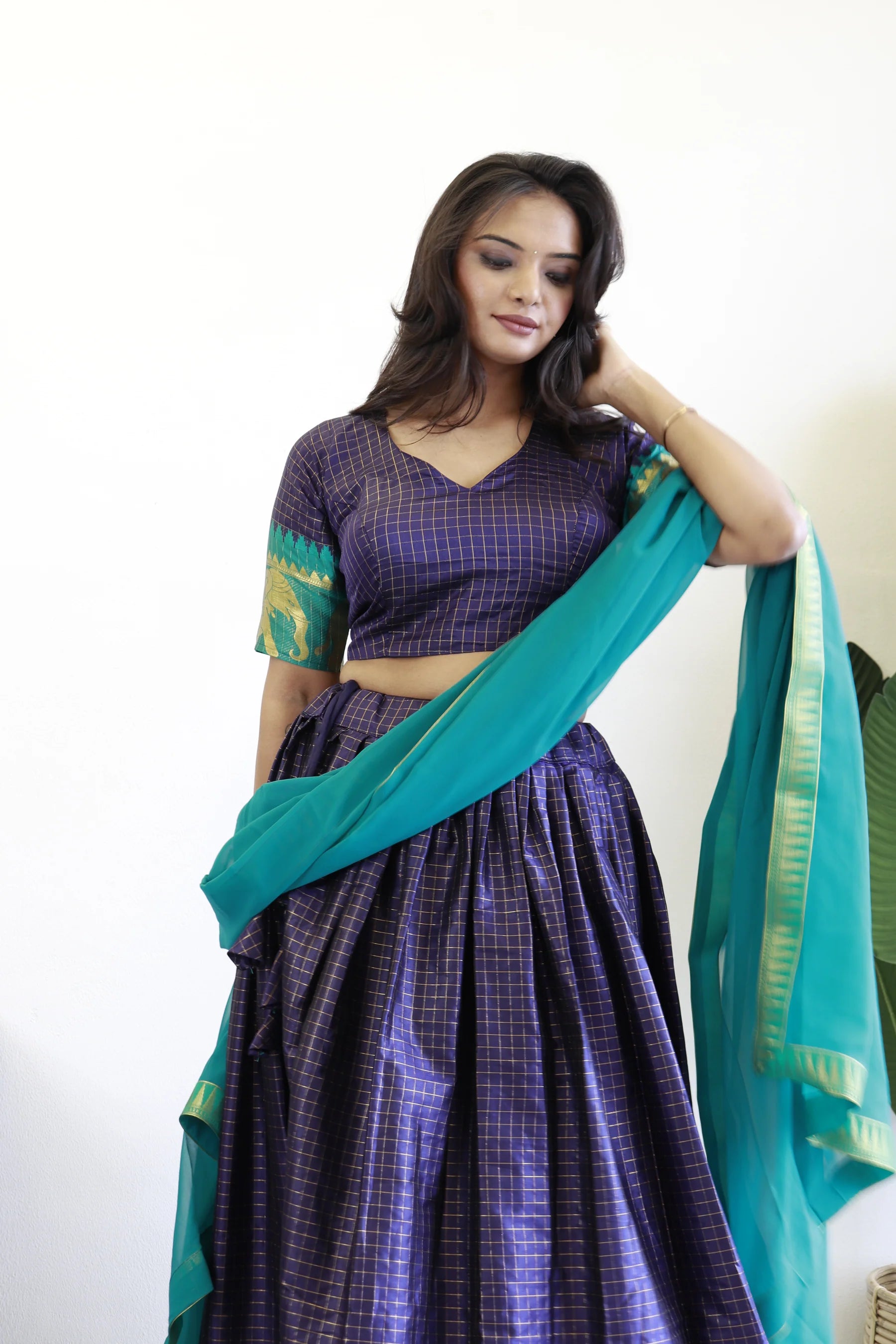 Elegant elephant blue checks silk lehenga, light shades to complement to create beautiful aura in all function