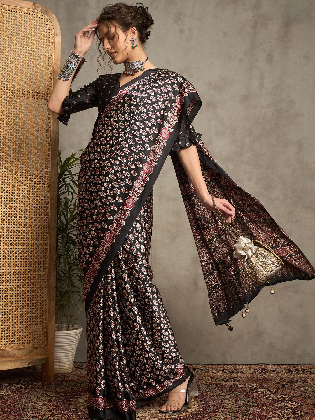 Black Gajji Silk Saree with Traditional Red & Beige Ajrakh Patterns and Tassel Detailing
