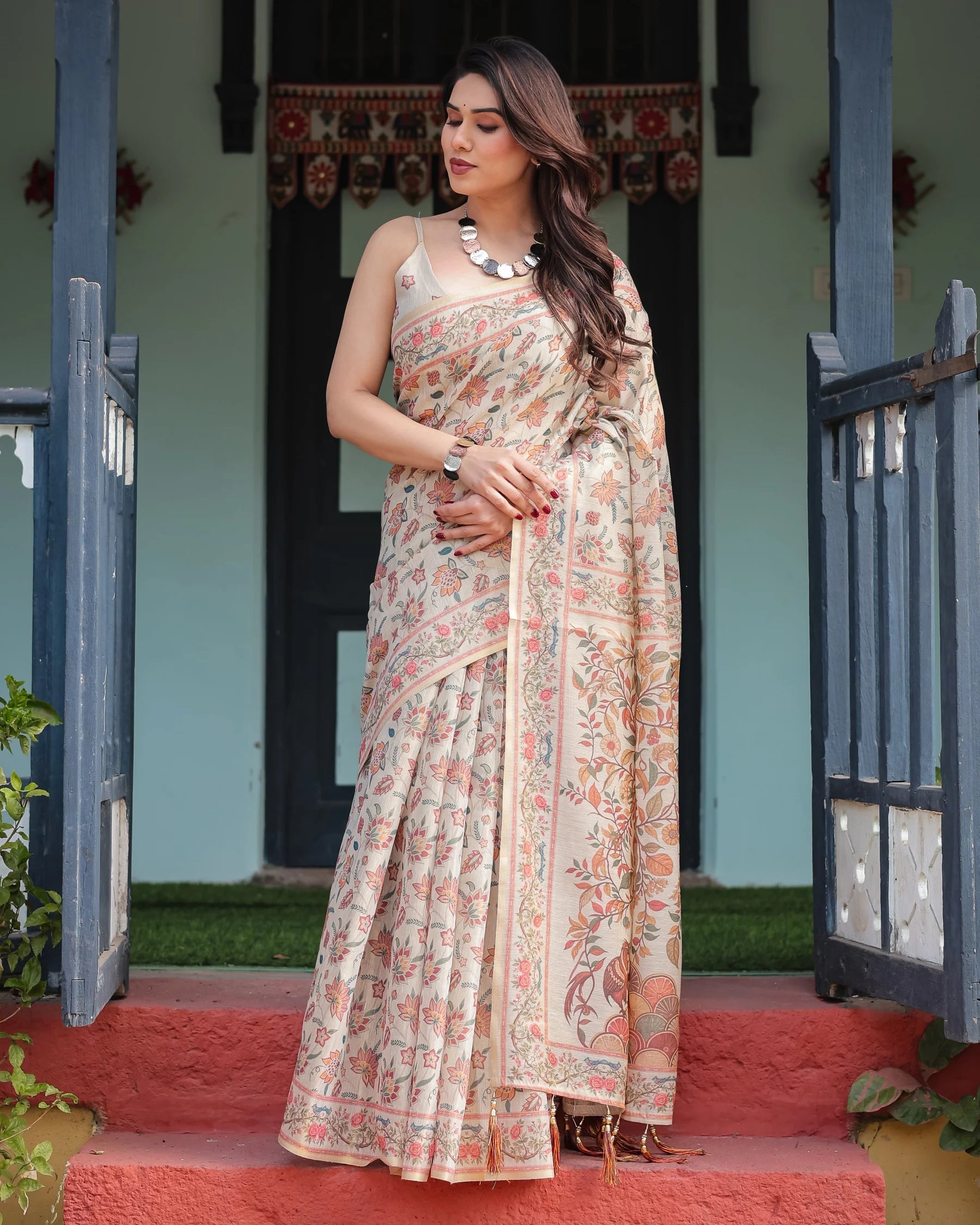 Elegant Beige Handloom Cotton-Linen Saree with Golden Zari Weave, Floral Printed Pallu & Tassel Detailing