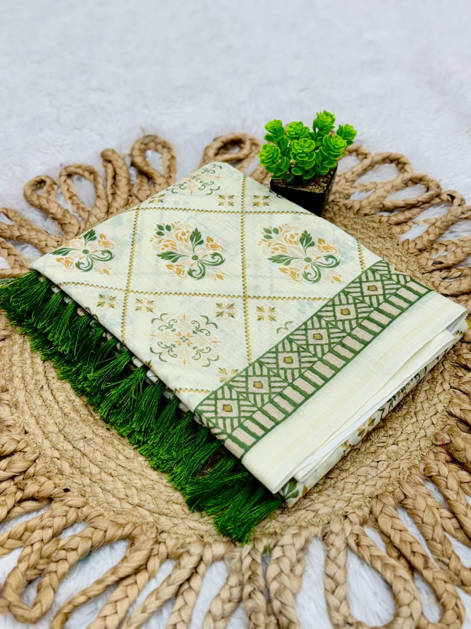 Elegant Cream and Green Cotton Saree with Floral Motifs