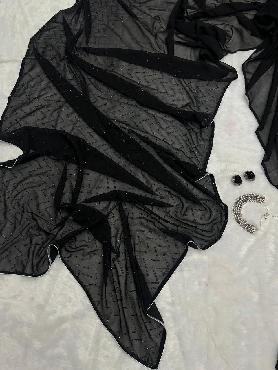 Pure Georgette saree with Swarovski Diamond work saree