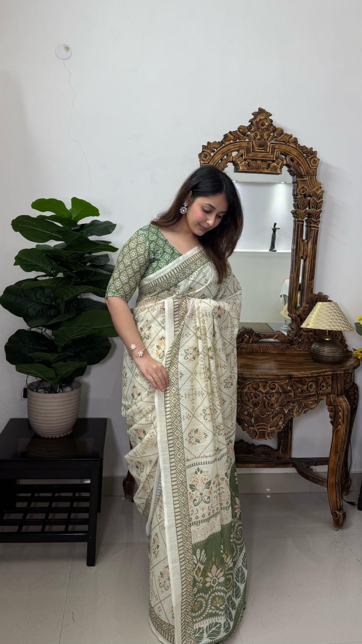 Elegant Cream and Green Cotton Saree with Floral Motifs