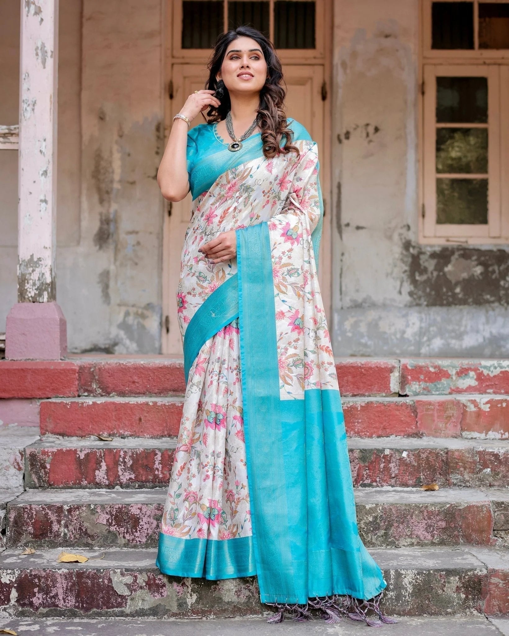 White and Aqua Floral Design Banarasi Silk Saree with Zari Weave and Tassel-Embellished Pallu