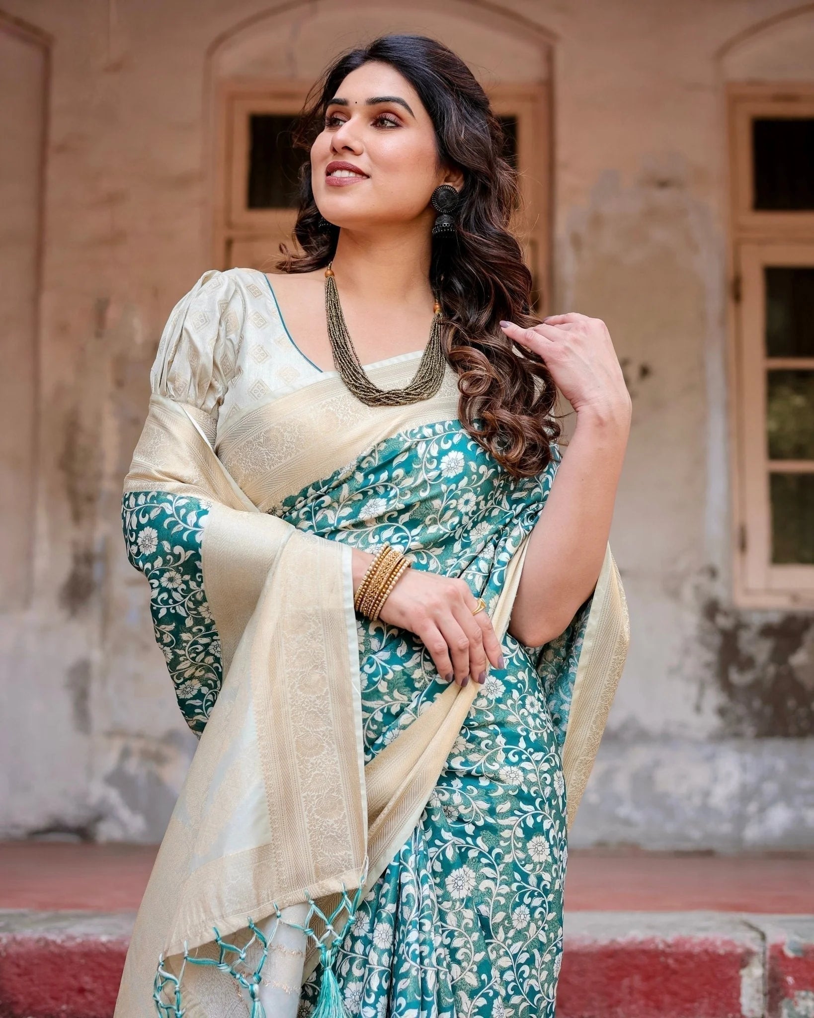 Teal and Cream Floral Banarasi Silk Saree with Zari Weave and Tassel-Accented Pallu