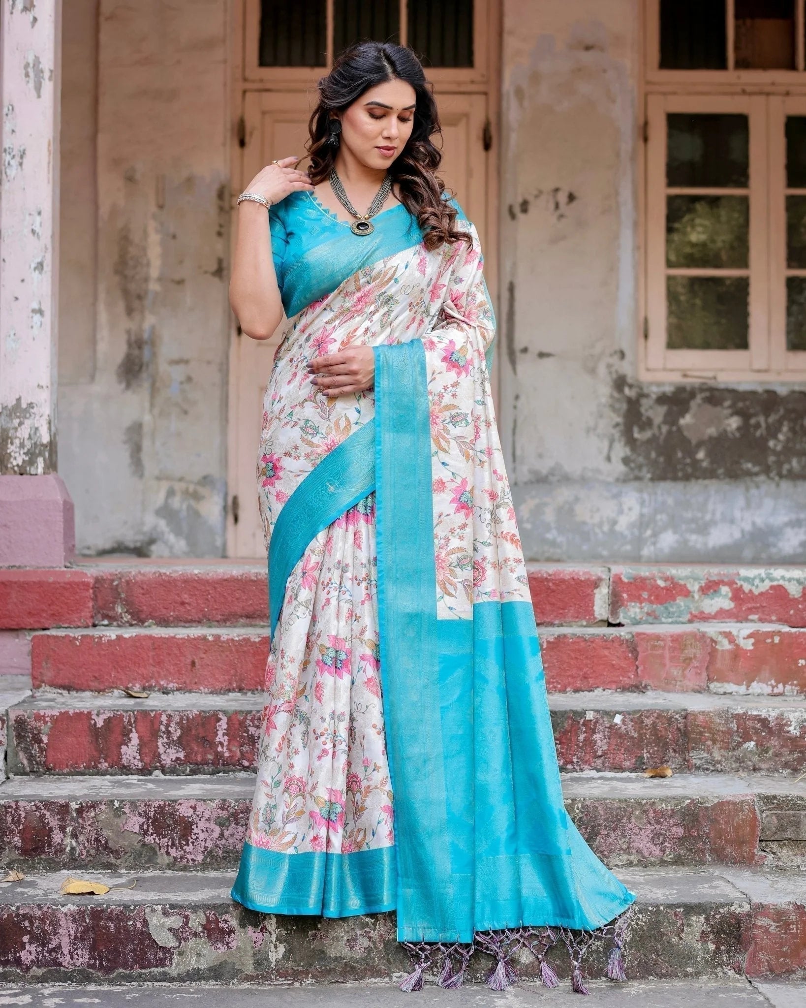White and Aqua Floral Design Banarasi Silk Saree with Zari Weave and Tassel-Embellished Pallu