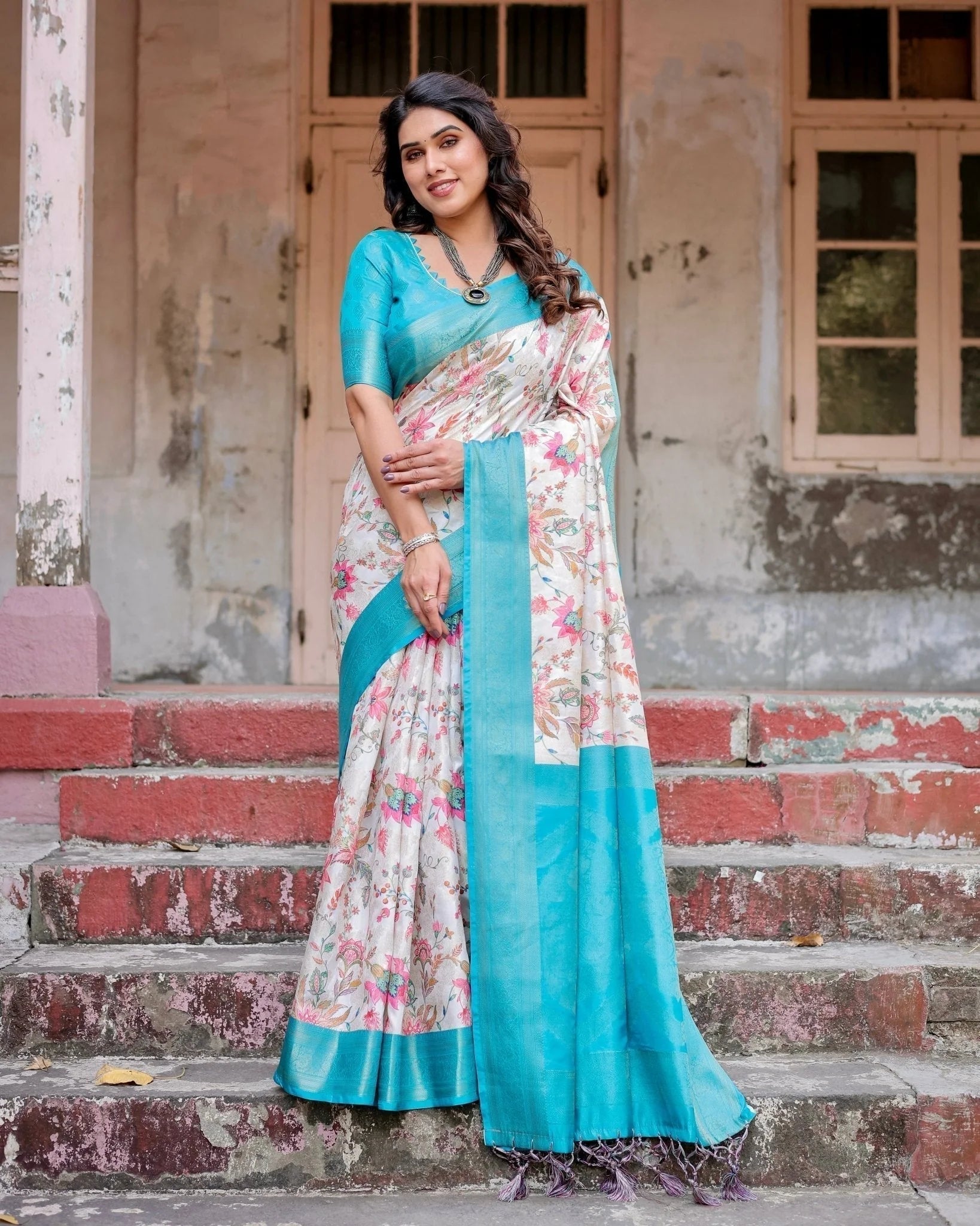 White and Aqua Floral Design Banarasi Silk Saree with Zari Weave and Tassel-Embellished Pallu