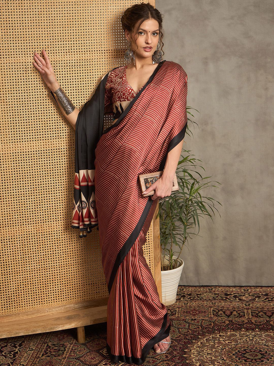 Contemporary Rust & Black Gajji Silk Saree with Tribal-Inspired Border & Printed Blouse