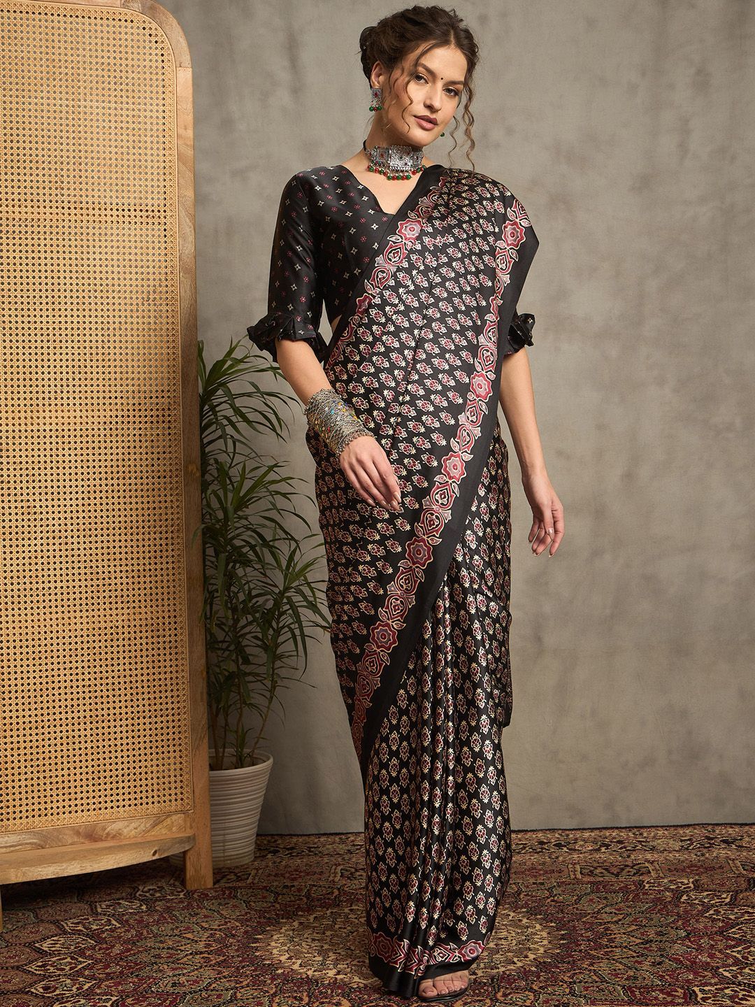 Black Gajji Silk Saree with Traditional Red & Beige Ajrakh Patterns and Tassel Detailing